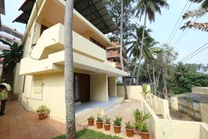 a view of the front of the house at Abad Serviced Villas in Kovalam