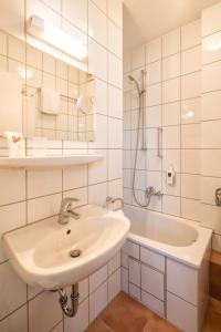 Koupelna v ubytování Hotel Isartor