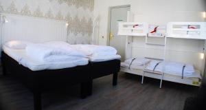 Letto o letti in una camera di Go to sleep Arvika
