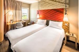Postel nebo postele na pokoji v ubytování Hotel ibis Faro Algarve + 37 fotografií