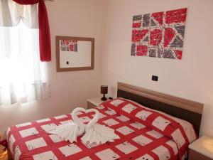 Łóżko lub łóżka w pokoju w obiekcie Apartments Medulin - Orijeta