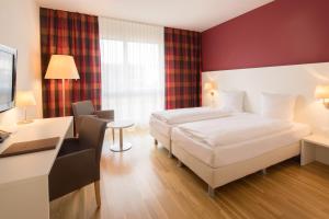 Postel nebo postele na pokoji v ubytování Hotel Arcade + 25 fotografií