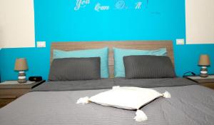 Posteľ alebo postele v izbe v ubytovaní L'Iris B&B