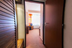 Posteľ alebo postele v izbe v ubytovaní Hotel Vsacan