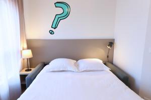 Cama o camas de una habitación en Apparteo Bordeaux