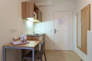 Una cocina o zona de cocina en Apparteo Bordeaux