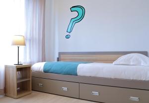 Cama o camas de una habitación en Apparteo Bordeaux