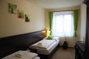 Voodi või voodid majutusasutuse Hotel Koruna Prachatice toas