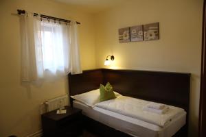 Voodi või voodid majutusasutuse Hotel Koruna Prachatice toas