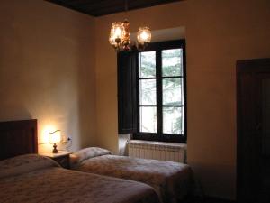 Posteľ alebo postele v izbe v ubytovaní Locanda Dei Baroni - Antica Dimora
