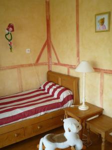 Postel nebo postele na pokoji v ubytování Château de Termes
