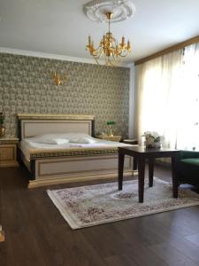 Postel nebo postele na pokoji v ubytování Hotel Adria
