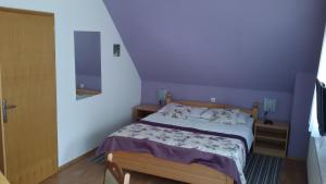 Posteľ alebo postele v izbe v ubytovaní Guest House Wolf