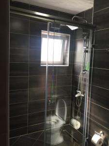 Koupelna v ubytování Hotel Adria + 37 fotografií