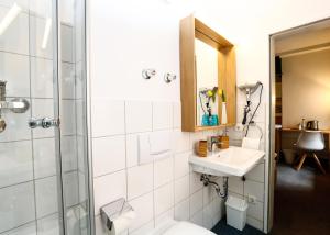 Koupelna v ubytování Hotel am Peterstor