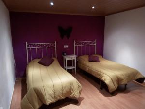 Postel nebo postele na pokoji v ubytování Casa Rural Benede + 4 fotografie