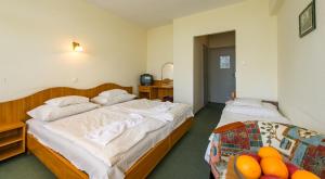Posteľ alebo postele v izbe v ubytovaní Hotel Nostra