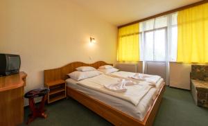 Posteľ alebo postele v izbe v ubytovaní Hotel Nostra