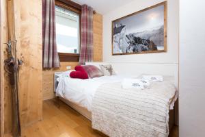 Krevet ili kreveti u jedinici u okviru objekta Le Paradis 8 apartment - Chamonix All Year