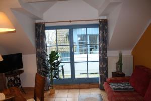 Ein Sitzbereich in der Unterkunft Ferienwohnung Urte in Putgarten , Kap Arkona Rügen
