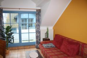 Ein Sitzbereich in der Unterkunft Ferienwohnung Urte in Putgarten , Kap Arkona Rügen