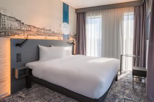 Postelja oz. postelje v sobi nastanitve ibis Styles Basel City