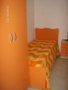 Кровать или кровати в номере Villino mare Anita