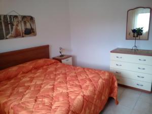Кровать или кровати в номере Villino mare Anita