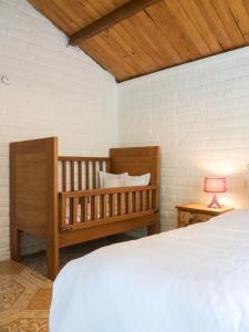 Кровать или кровати в номере Pacheco Farmhouse - Intag Valley