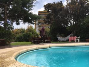 Swimming pool sa o malapit sa Villa Olimpia Cabañas