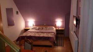Posteľ alebo postele v izbe v ubytovaní Guest House Wolf