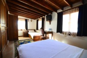 Postel nebo postele na pokoji v ubytování Ayışığı Hotel