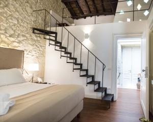 A bed or beds in a room at Arcipelago 41