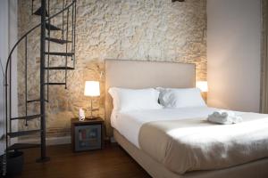 A bed or beds in a room at Arcipelago 41
