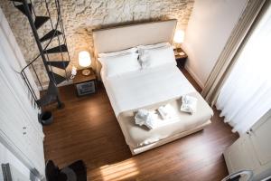 A bed or beds in a room at Arcipelago 41