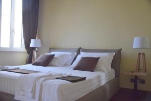 A bed or beds in a room at Domus Corsini