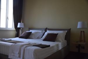 A bed or beds in a room at Domus Corsini