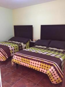 Letto o letti in una camera di Posada Quinta Alejandra