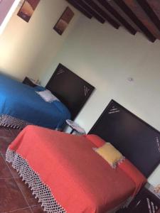 Letto o letti in una camera di Posada Quinta Alejandra