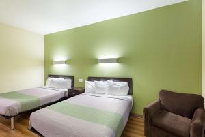 Ένα ή περισσότερα κρεβάτια σε δωμάτιο στο Motel 6-Fort Worth, TX +30 φωτογραφίες