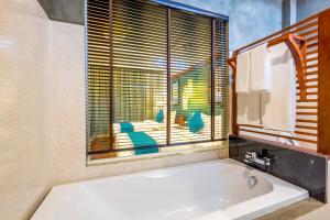 Vannituba majutusasutuses The Tito Suite Residence