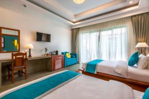 Voodi või voodid majutusasutuse The Tito Suite Residence toas