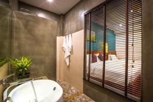 Vannituba majutusasutuses The Tito Suite Residence