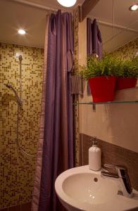 Koupelna v ubytování BpR City Center Design Apartments