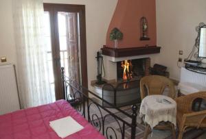 Postel nebo postele na pokoji v ubytování Guesthouse Xenioti