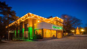 a building with lights on top of it at night at Boutique Hotel Zelenyy Teatr in Simferopol