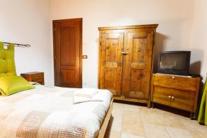 A bed or beds in a room at Casa Martin