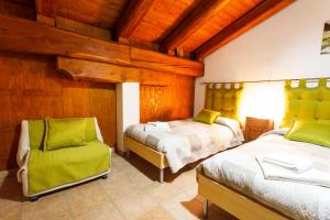 A bed or beds in a room at Casa Martin