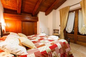 A bed or beds in a room at Casa Martin