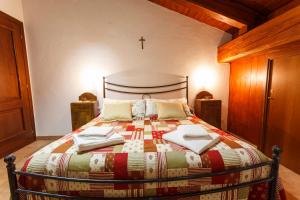 A bed or beds in a room at Casa Martin